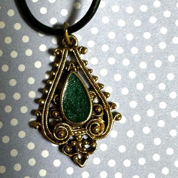 Green and gold tone pendant necklace on black cord - Picture 3 of 8